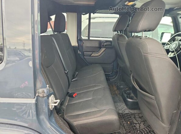 1C4BJWDG8JL879716 2018 JEEP WRANGLER Blue Widok tylnych siedzeń