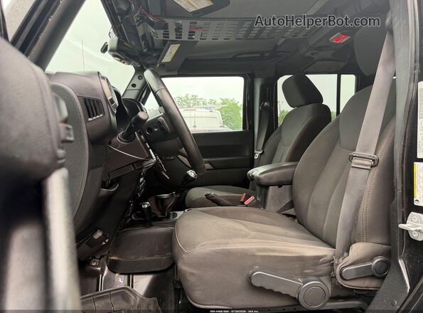 1C4BJWDG9GL106844 2016 JEEP WRANGLER UNLIMITED Black Widok wnętrza z przodu