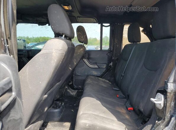 1C4BJWDGXGL204748 2016 JEEP WRANGLER Black Rear interior view