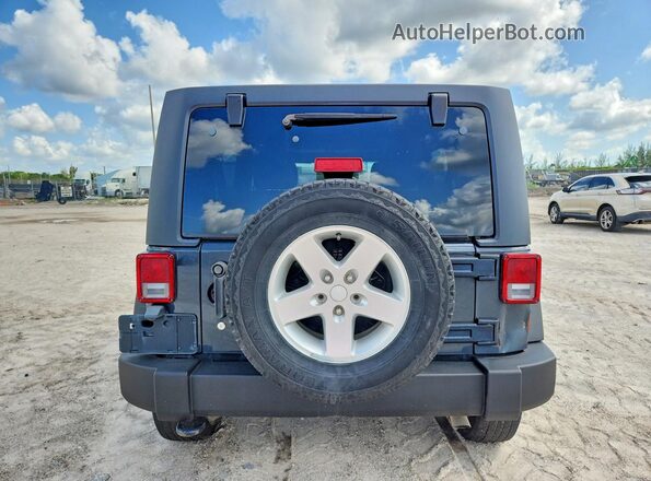 1C4BJWDGXGL207228 2016 JEEP WRANGLER Gray Widok z tyłu