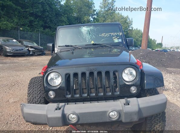1C4BJWEG3GL205481 2016 JEEP WRANGLER UNLIMITED Black Widok wnętrza z tyłu