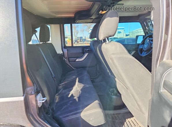 1C4BJWEG9GL275115 2016 JEEP WRANGLER Черный Вид задней части салона