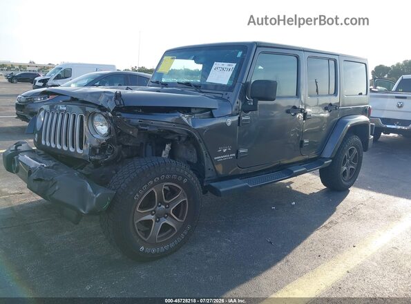 1C4BJWEG9GL303589 2016 JEEP WRANGLER UNLIMITED Gray Vista tres cuartos delantera izquierda