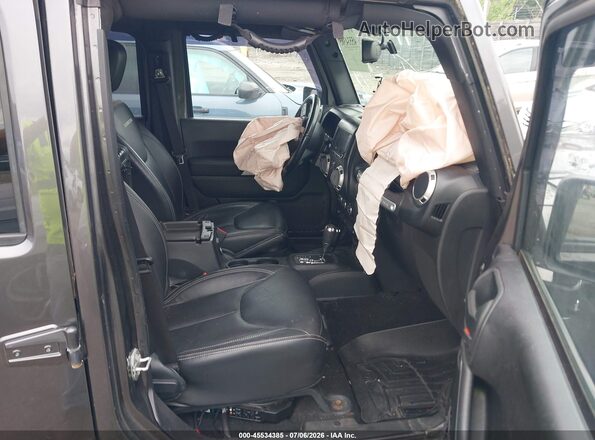 1C4BJWFG0GL347768 2016 JEEP WRANGLER UNLIMITED Gray Front interior view