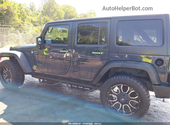 1C4BJWFG2GL240429 2016 JEEP WRANGLER UNLIMITED Gray Rear interior view