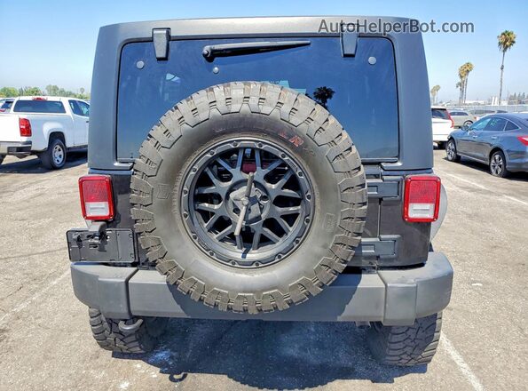 1C4BJWFG6JL809774 2018 JEEP WRANGLER Black Rear view