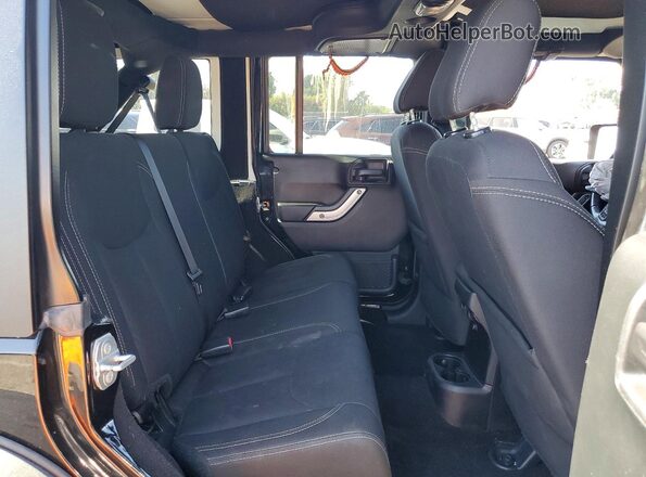 1C4BJWFG6JL809774 2018 JEEP WRANGLER Black Rear interior view