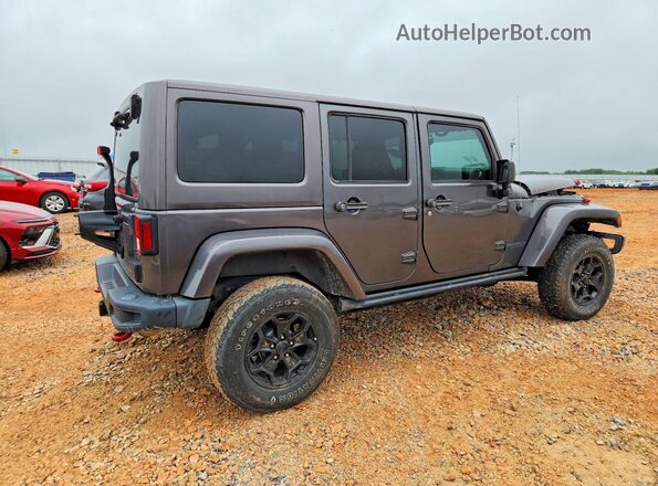 1C4BJWFG9HL563703 2017 JEEP WRANGLER Gray Trasero derecho