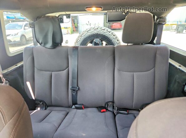 1C4BJWKG4GL293638 2016 JEEP WRANGLER Black Rear seats view