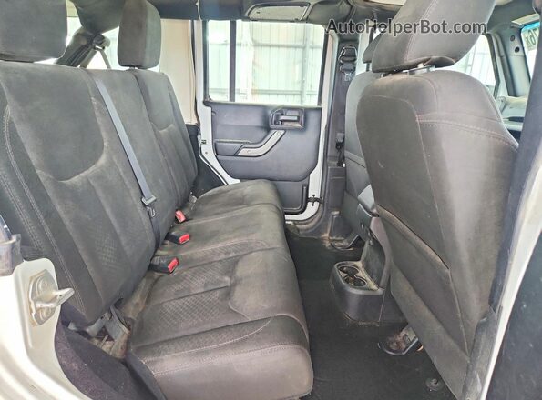 1C4BJWKG8GL232700 2016 JEEP WRANGLER White Vista interior trasera