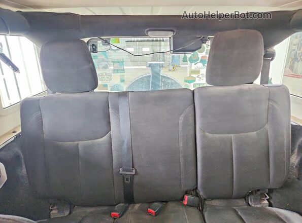 1C4BJWKG8GL232700 2016 JEEP WRANGLER White Vista de los asientos traseros