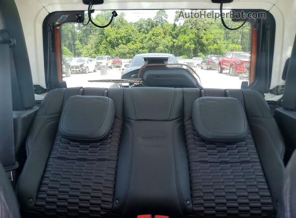 1C4GJXAN0PW571963 2023 JEEP WRANGLER Фиолетовый Вид задних сидений