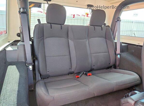 1C4GJXAN0PW679497 2023 JEEP WRANGLER Черный Вид задней части салона
