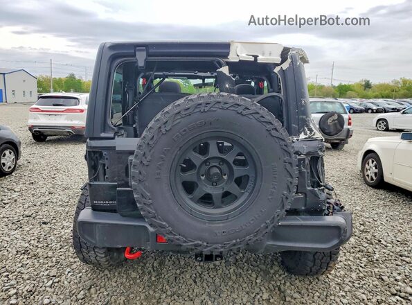 1C4HJXCG7PW614195 2023 JEEP WRANGLER Black Vista trasera
