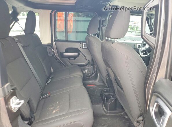 1C4HJXDG5JW169963 2018 JEEP WRANGLER Gray Vista interior trasera