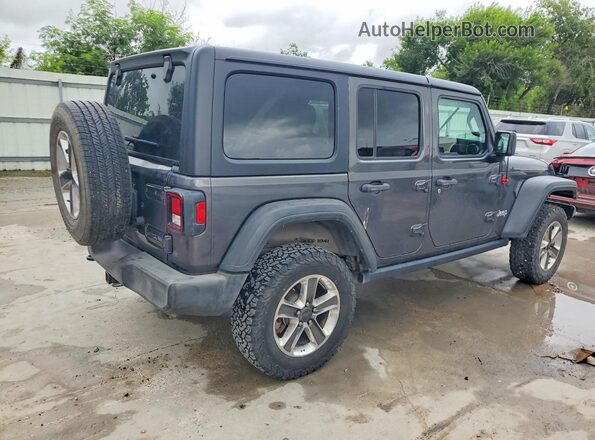1C4HJXDG5JW169963 2018 JEEP WRANGLER Gray Trasero derecho