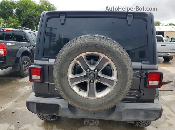 1C4HJXDG5JW169963 2018 JEEP WRANGLER Gray Vista trasera