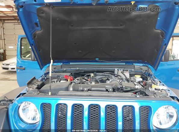 1C4HJXDG9PW686658 2023 JEEP WRANGLER Синий Вид сзади