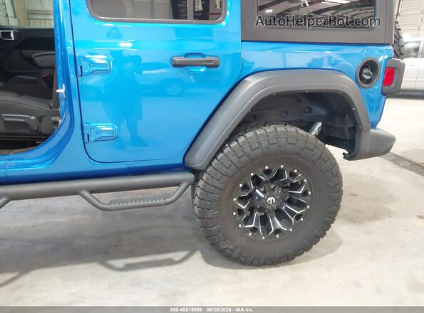 1C4HJXDG9PW686658 2023 JEEP WRANGLER Синий Вид спереди