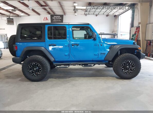 1C4HJXDG9PW686658 2023 JEEP WRANGLER Синий Вид задней части салона