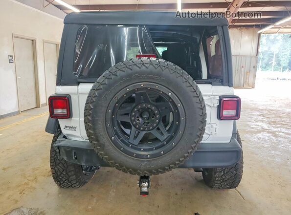 1C4HJXDN7PW522775 2023 JEEP WRANGLER White Rear view