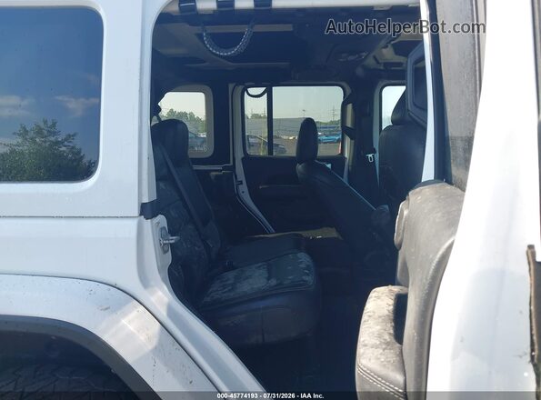 1C4HJXEG6JW214052 2018 JEEP WRANGLER UNLIMITED White Widok naklejki z numerem VIN