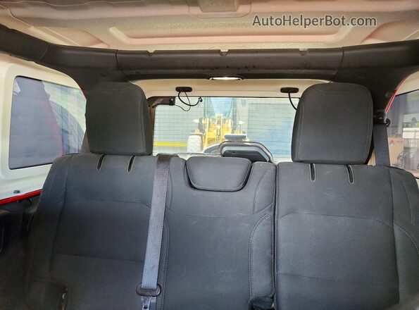 1C4HJXEN8KW511307 2019 JEEP WRANGLER Red Rear seats view
