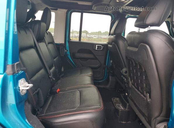 1C4HJXFG2KW631202 2019 JEEP WRANGLER Teal Вид задньої частини салону