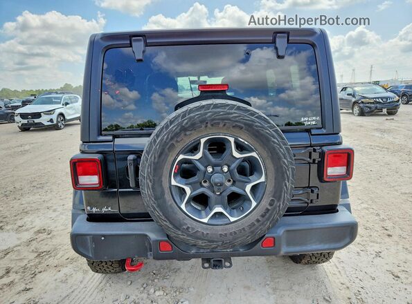 1C4HJXFN0PW598657 2023 JEEP WRANGLER Black Հետևի տեսք