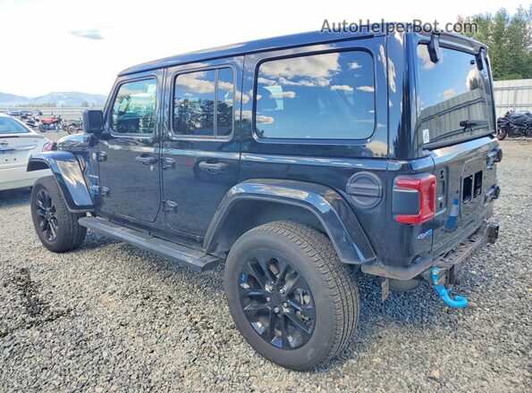 1C4JJXP62PW557472 2023 JEEP WRANGLER Black Trasero izquierdo