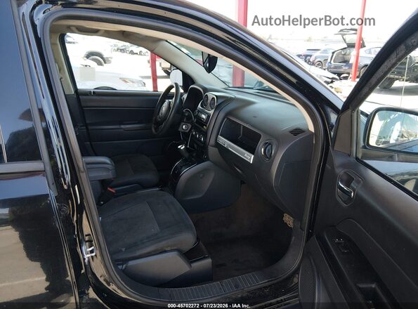 1C4NJCBA7GD560529 2016 JEEP COMPASS Черный Вид салона спереди