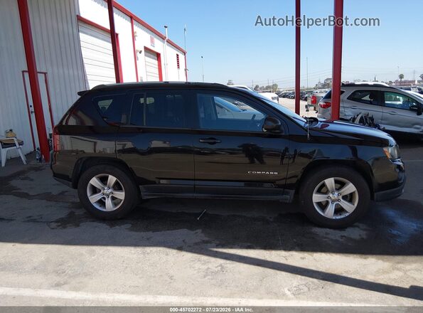 1C4NJCBA7GD560529 2016 JEEP COMPASS Черный Вид задней части салона