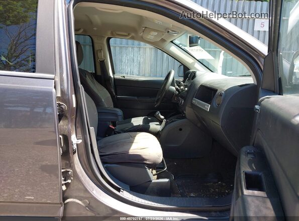 1C4NJCBB3GD506461 2016 JEEP COMPASS Серый Вид салона спереди