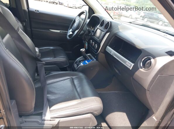 1C4NJCEA6GD699370 2016 JEEP COMPASS Черный Вид салона спереди
