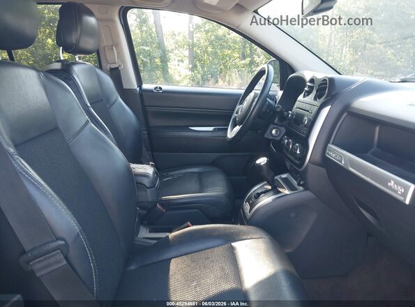 1C4NJCEAXGD615048 2016 JEEP COMPASS Gray Front interior view