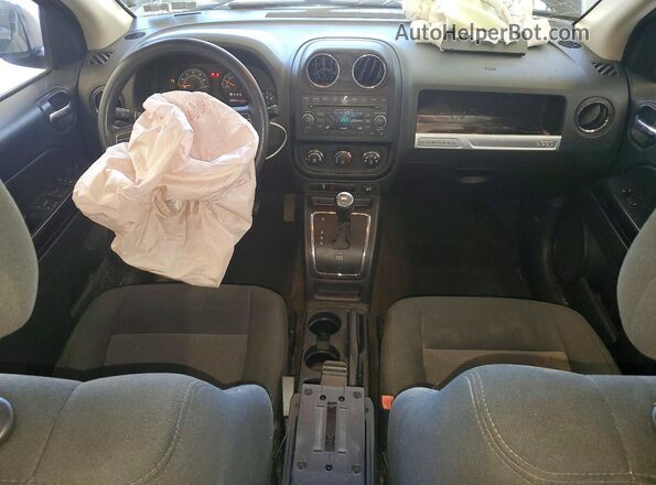 1C4NJDBB3GD522603 2016 JEEP COMPASS Black Dashboard view