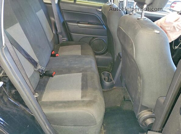 1C4NJDBB3GD522603 2016 JEEP COMPASS Black Rear interior view
