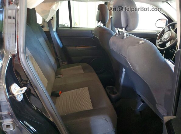 1C4NJDBB3GD780345 2016 JEEP COMPASS Black Widok wnętrza z tyłu