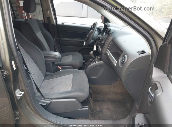 1C4NJDBB9GD509970 2016 JEEP COMPASS Green Widok wnętrza z przodu