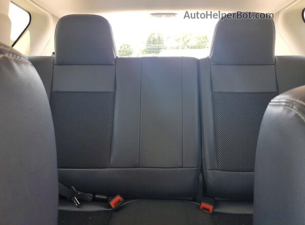 1C4NJDEB1GD631184 2016 JEEP COMPASS Gray Widok tylnych siedzeń
