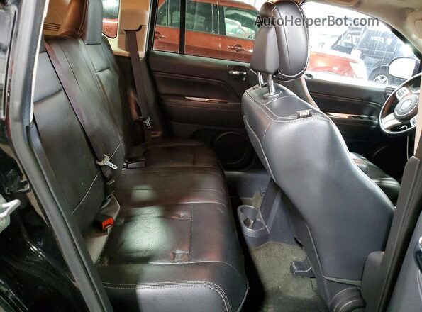 1C4NJDEB2GD674111 2016 JEEP COMPASS Black Vista de los asientos traseros