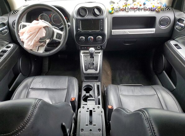 1C4NJDEB2GD696612 2016 JEEP COMPASS Серый Вид панели приборов
