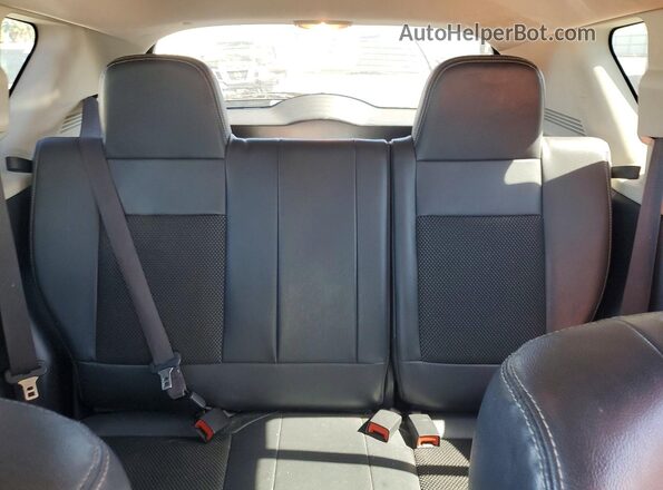 1C4NJDEB6GD781999 2016 JEEP COMPASS Silver Rear seats view