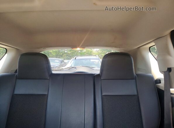 1C4NJDEBXGD663048 2016 JEEP COMPASS Black უკანა სავარძლების ხედი