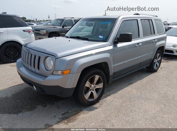 1C4NJPFAXGD652140 2016 JEEP PATRIOT Серебряный Передняя левая четверть