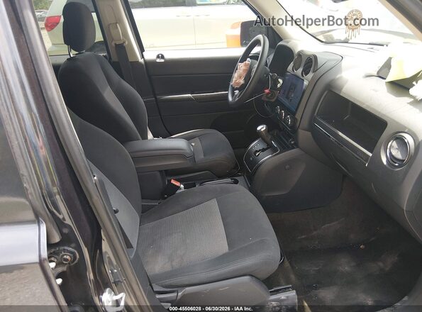 1C4NJRBB8GD521525 2016 JEEP PATRIOT Черный Вид салона спереди