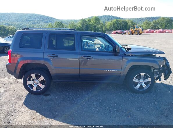 1C4NJRFB3GD653599 2016 JEEP PATRIOT Серый Вид задней части салона