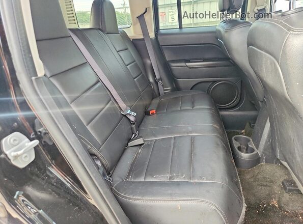 1C4NJRFB9GD745509 2016 JEEP PATRIOT Black Rear interior view