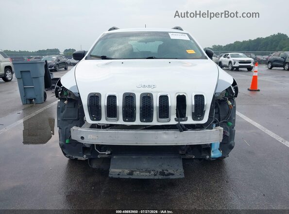 1C4PJLAB6GW107011 2016 JEEP CHEROKEE White Vista interior trasera