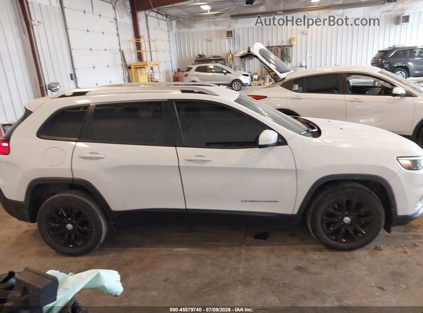 1C4PJLCB9MD104026 2021 JEEP CHEROKEE White Widok wnętrza z tyłu